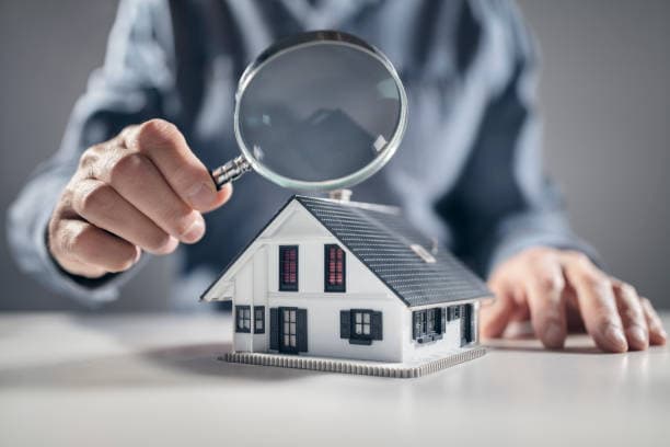 Home Inspection with magnifying glass