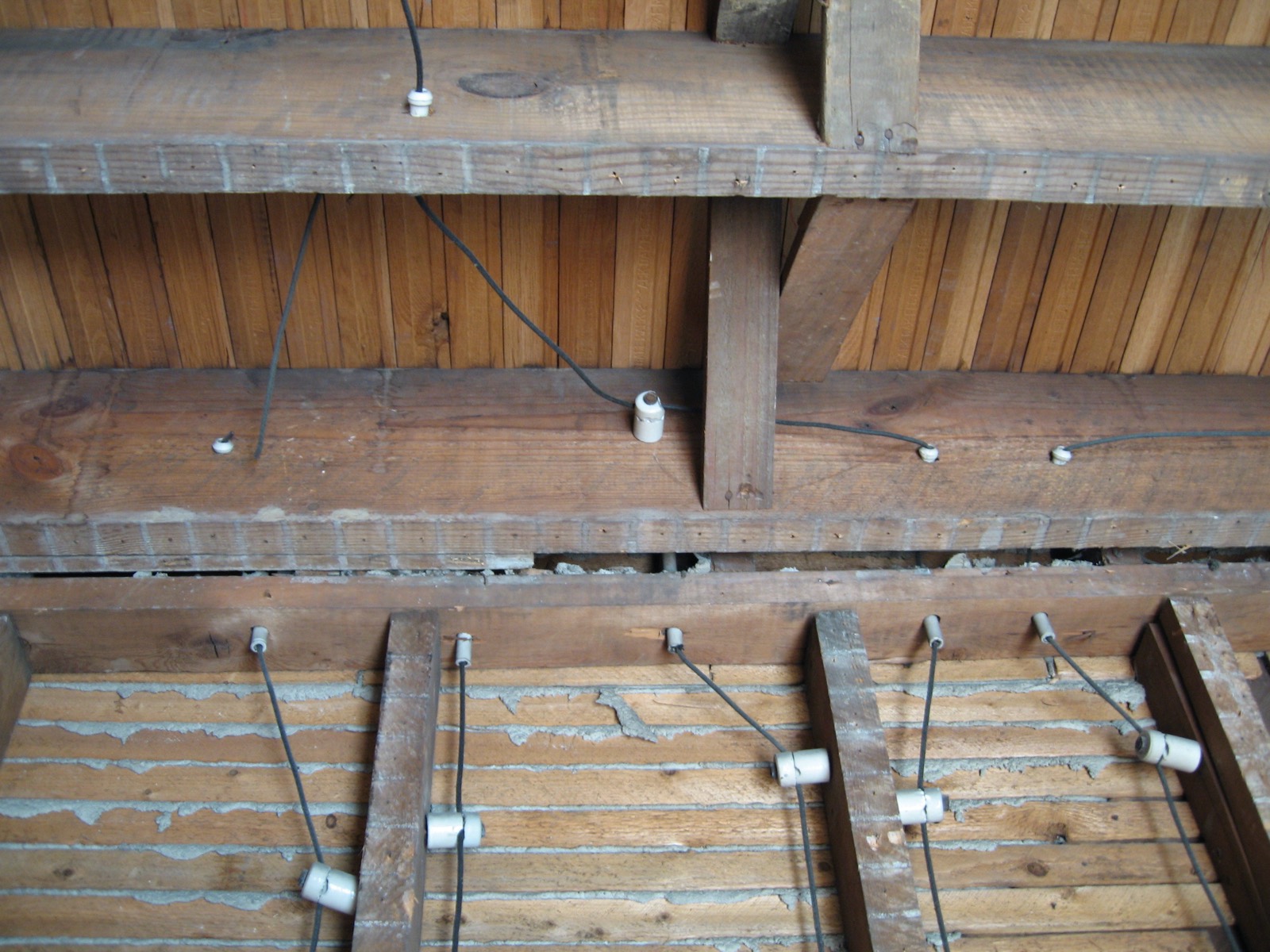 Original knob and tube wiring in the attic of an older Pittsburgh home